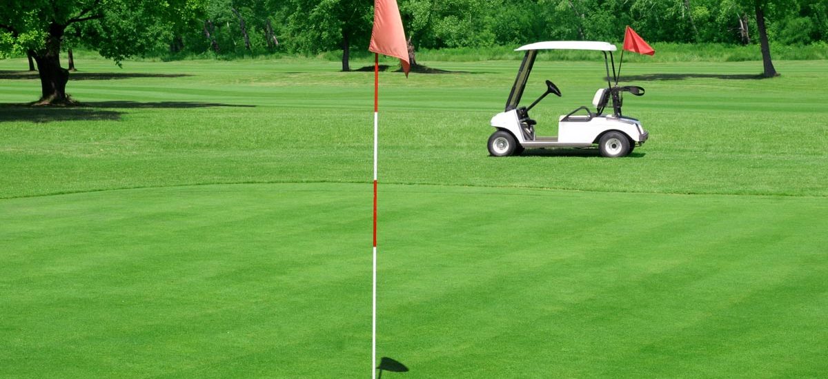 bigstock-Golf-Course-And-Vehicle-1731674